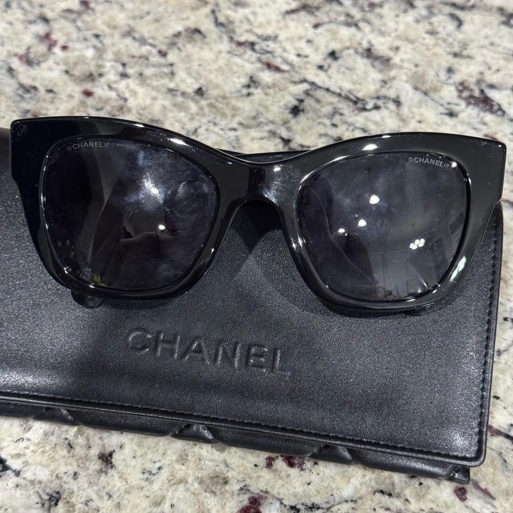 CHANEL Black and Gold Sunglasses with Signature Embellishments - Picture 3 of 5